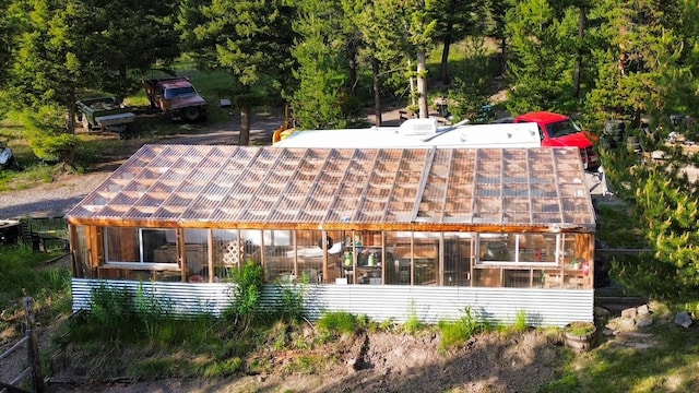 912 Muskrat Rd, Helmville, MT 59843 - rear view of property with an exterior structure and an outdoor structure