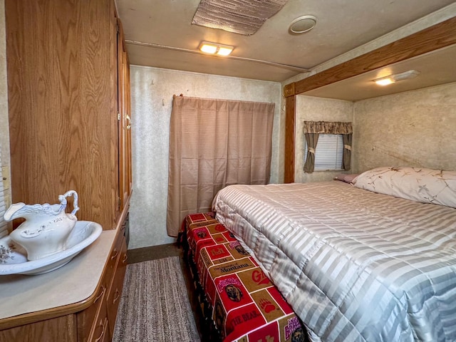 912 Muskrat Rd, Helmville, MT 59843 - bedroom featuring dark carpet