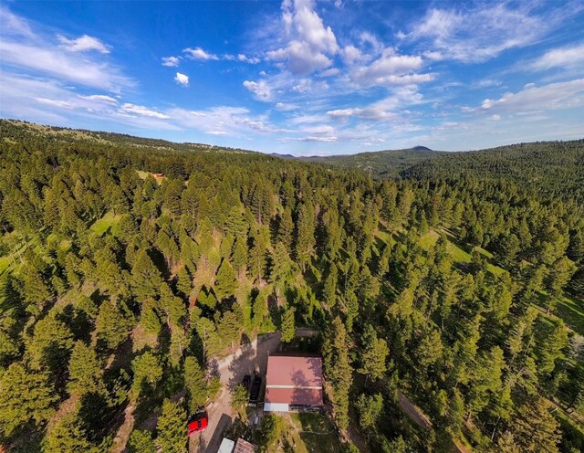 912 Muskrat Rd, Helmville, MT 59843 - drone / aerial view of a heavily wooded area