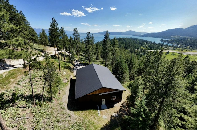 20536 Wild Horse Ranch Rd, Rollins, MT 59931 - view from above of property featuring a mountainous background and a heavily wooded area