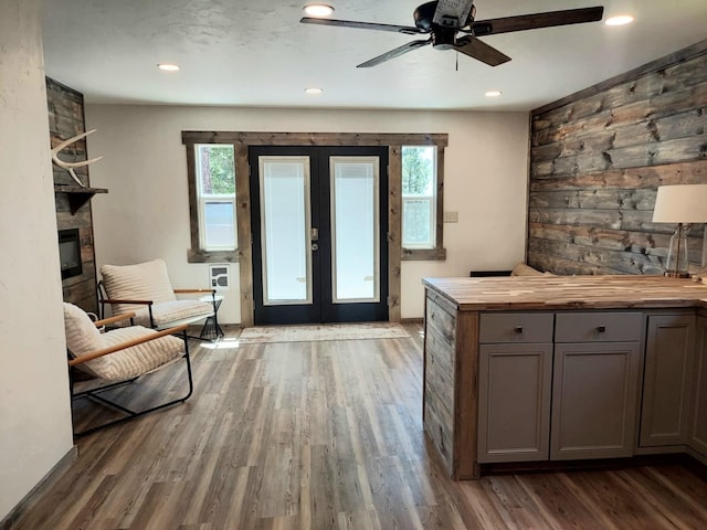 20536 Wild Horse Ranch Rd, Rollins, MT 59931 - foyer featuring french doors, plenty of natural light, wood finished floors, ceiling fan, and recessed lighting