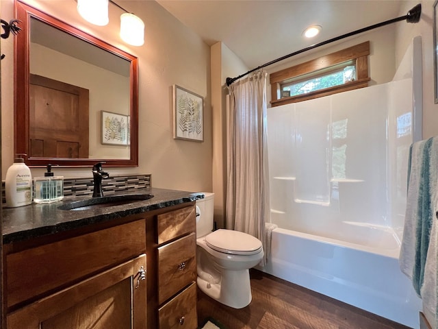 120 Chickadee Way, Whitefish, MT 59937 - full bathroom featuring vanity, shower / bathtub combination with curtain, wood finished floors, and recessed lighting