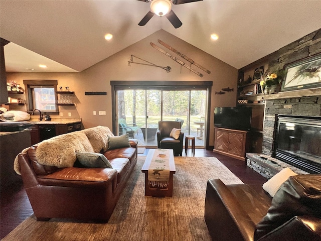 120 Chickadee Way, Whitefish, MT 59937 - living room with a ceiling fan, wood finished floors, recessed lighting, a stone fireplace, and high vaulted ceiling