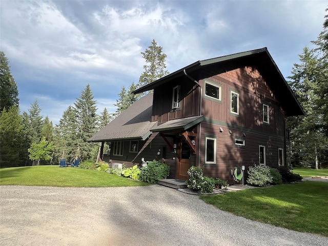 120 Chickadee Way, Whitefish, MT 59937 - view of front of house with a front yard
