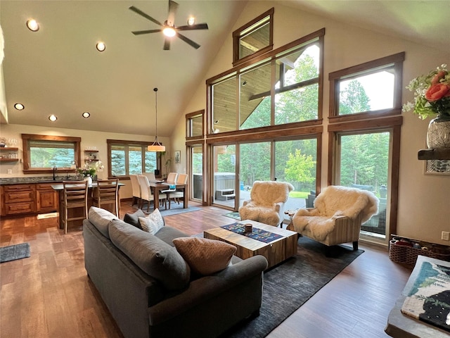 120 Chickadee Way, Whitefish, MT 59937 - living area featuring high vaulted ceiling, ceiling fan, wood finished floors, and recessed lighting