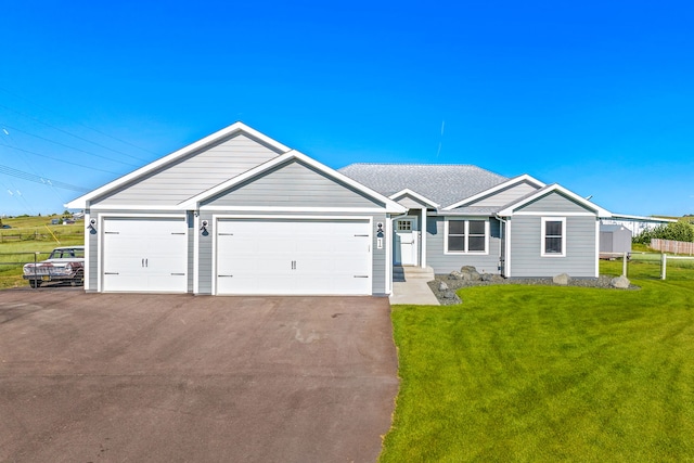 1 Arizona Rd, Great Falls, MT 59404 - ranch-style home with a front yard, an attached garage, and driveway