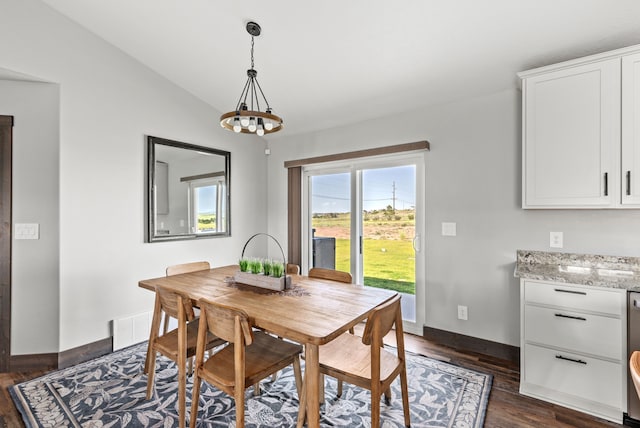 1 Arizona Rd, Great Falls, MT 59404 - dining room with dark wood finished floors, vaulted ceiling, and a chandelier