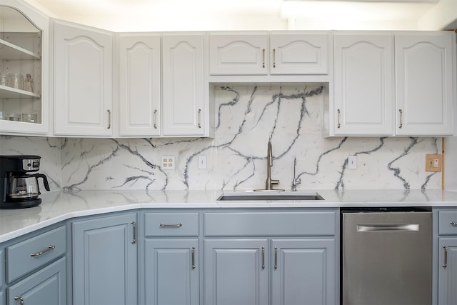 3333 Middle Rd, Columbia Falls, MT 59912 - kitchen with dishwasher, decorative backsplash, glass insert cabinets, and white cabinets