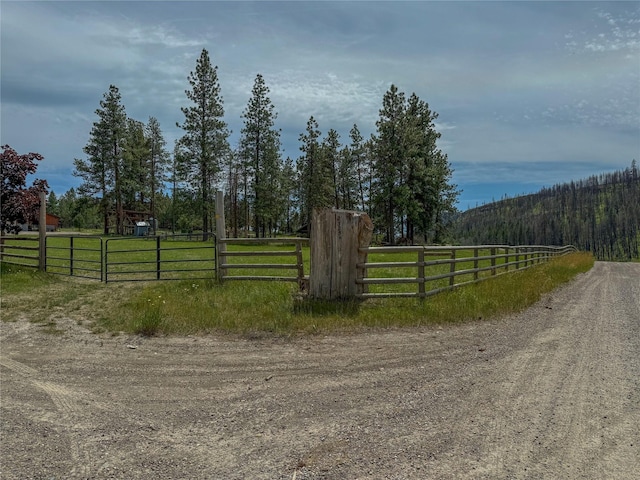 23254 Dayton Creek Rd, Proctor, MT 59929 - view of dirt / gravel road with a view of countryside and a forest view
