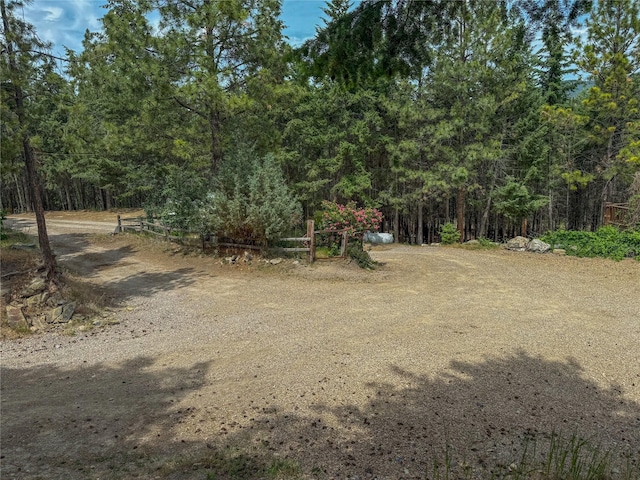 23254 Dayton Creek Rd, Proctor, MT 59929 - view of yard with a forest view