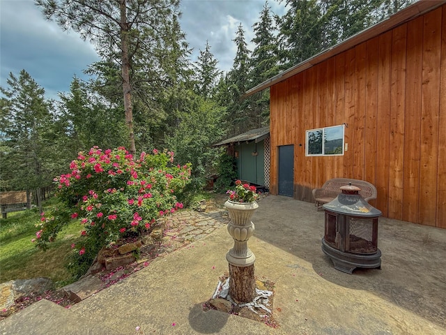 23254 Dayton Creek Rd, Proctor, MT 59929 - view of yard with a patio and an outdoor fire pit