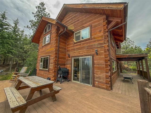 23254 Dayton Creek Rd, Proctor, MT 59929 - rear view of property with a wooden deck