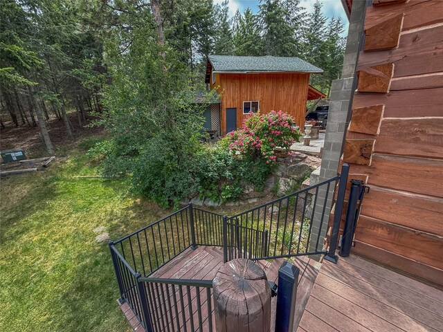 23254 Dayton Creek Rd, Proctor, MT 59929 - wooden terrace with stairway and a yard