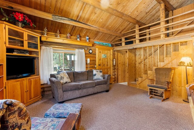 392 Leisure Ln, Sula, MT 59871 - carpeted living area featuring stairs, wood ceiling, and wood walls
