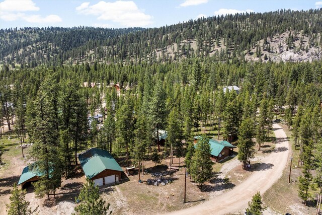 392 Leisure Ln, Sula, MT 59871 - bird's eye view of a heavily wooded area and mountains