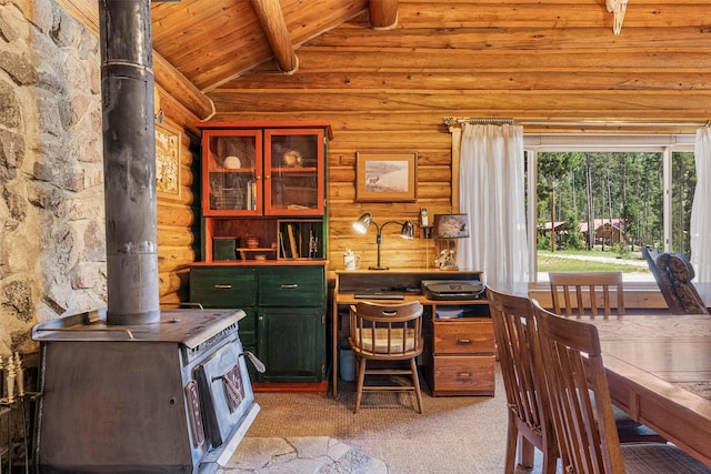 392 Leisure Ln, Sula, MT 59871 - office with a wood stove, log walls, wood ceiling, and light colored carpet
