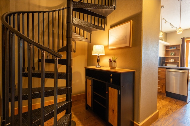 62 S Last Chance Gulch Gulch Unit 5, Helena, MT 59601 - stairway featuring wood finished floors and a textured wall