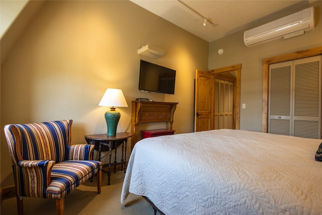 62 S Last Chance Gulch Gulch Unit 5, Helena, MT 59601 - bedroom with a wall mounted AC, carpet flooring, and rail lighting
