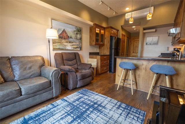 62 S Last Chance Gulch Gulch Unit 5, Helena, MT 59601 - living area featuring dark wood finished floors and track lighting