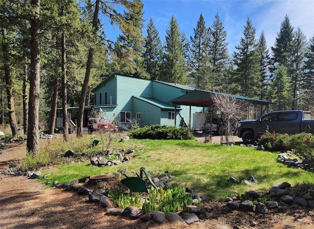 74 Cedar Crk, Libby, MT 59923 - view of front of home with a front yard