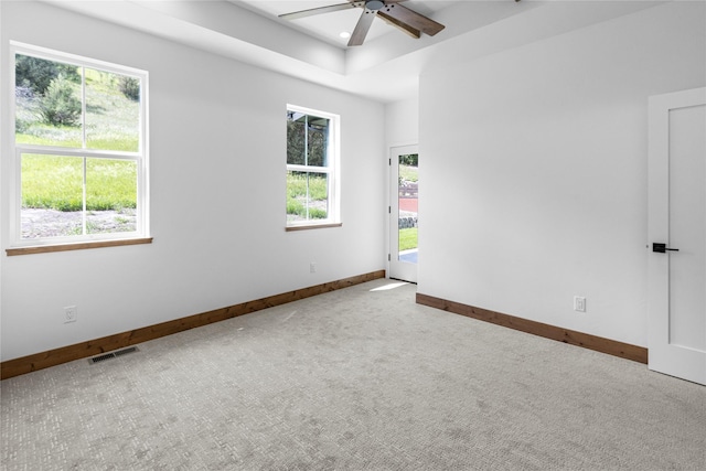 237 W Nicklaus Ave, Kalispell, MT 59901 - carpeted spare room featuring ceiling fan, a tray ceiling, and recessed lighting