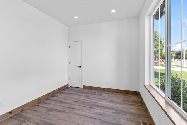 237 W Nicklaus Ave, Kalispell, MT 59901 - unfurnished room with plenty of natural light, wood finished floors, and recessed lighting