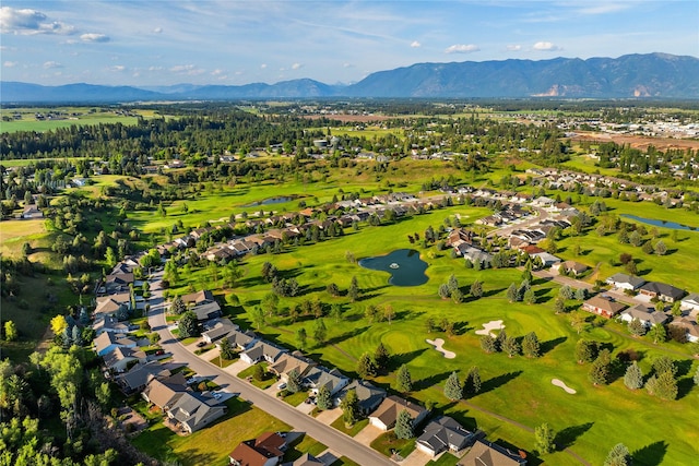 237 W Nicklaus Ave, Kalispell, MT 59901 - aerial perspective of suburban area featuring a water and mountain view and a golf course