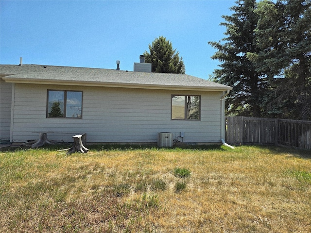 1401 Park Garden Rd, Great Falls, MT 59404 - view of side of home featuring a chimney and roof with shingles