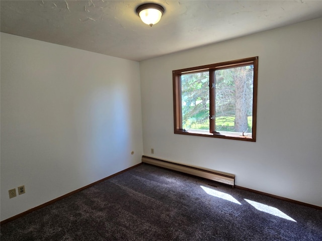 1401 Park Garden Rd, Great Falls, MT 59404 - spare room featuring baseboard heating and dark colored carpet