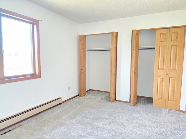 1401 Park Garden Rd, Great Falls, MT 59404 - unfurnished bedroom with a baseboard radiator and carpet flooring