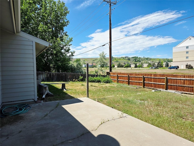 1401 Park Garden Rd, Great Falls, MT 59404 - fenced backyard with a patio area