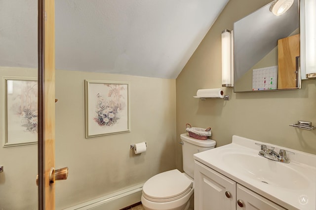 216 W Riggs St, East Helena, MT 59635 - bathroom featuring vaulted ceiling, vanity, and a baseboard heating unit