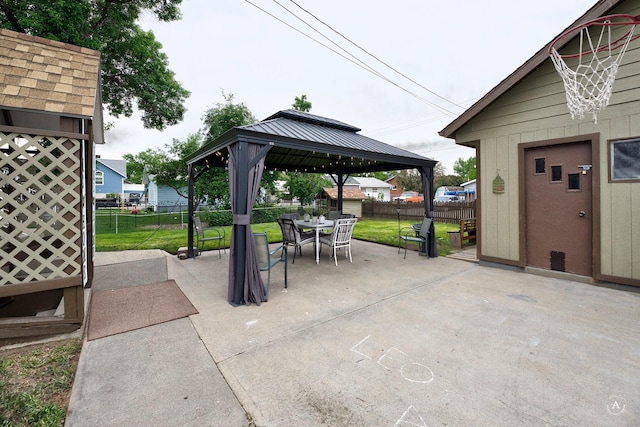 216 W Riggs St, East Helena, MT 59635 - view of patio with a gazebo and outdoor dining space