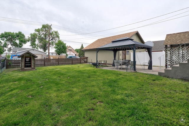 216 W Riggs St, East Helena, MT 59635 - fenced backyard featuring a patio area and a gazebo