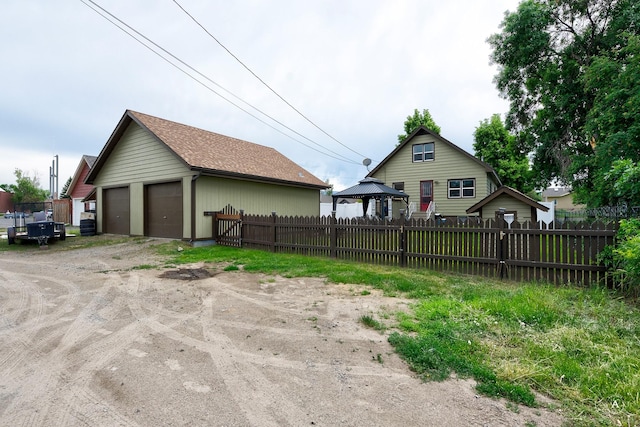 216 W Riggs St, East Helena, MT 59635 - view of yard featuring a gazebo and a detached garage