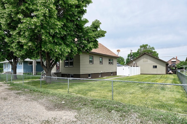 216 W Riggs St, East Helena, MT 59635 - view of property exterior featuring a fenced backyard