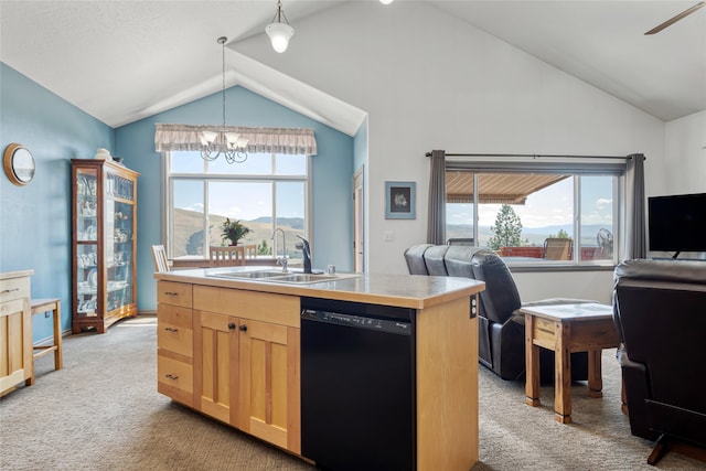 467 Ridgeway Dr, Lolo, MT 59847 - kitchen featuring dishwasher, vaulted ceiling, light colored carpet, and open floor plan