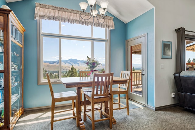467 Ridgeway Dr, Lolo, MT 59847 - dining space with a chandelier, carpet, a mountain view, healthy amount of natural light, and lofted ceiling