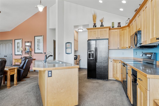 467 Ridgeway Dr, Lolo, MT 59847 - kitchen with black appliances, light brown cabinetry, light colored carpet, high vaulted ceiling, and open floor plan