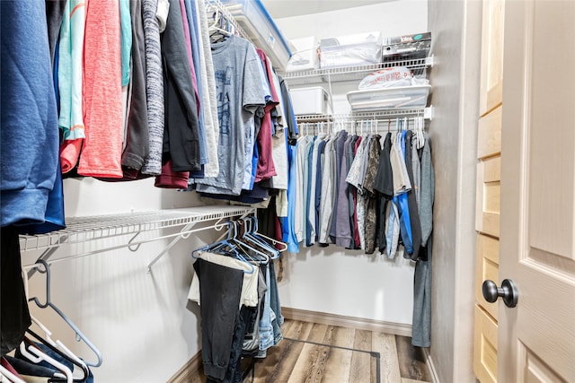 467 Ridgeway Dr, Lolo, MT 59847 - walk in closet with wood finished floors