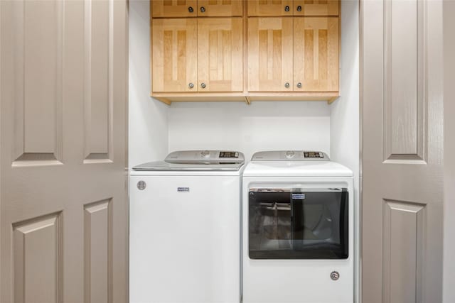 467 Ridgeway Dr, Lolo, MT 59847 - laundry room featuring cabinet space and washer and clothes dryer