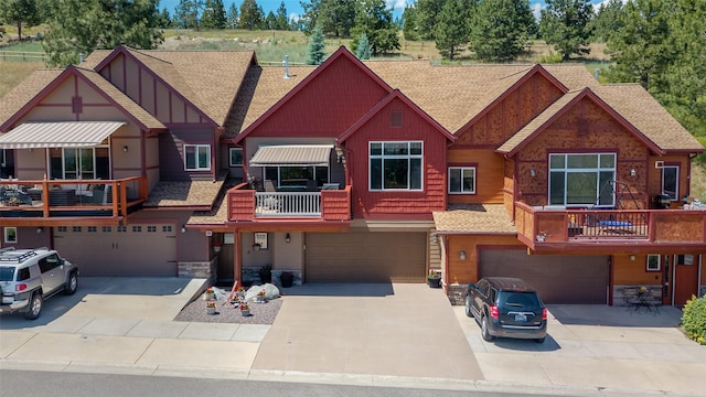 467 Ridgeway Dr, Lolo, MT 59847 - multi unit property with a garage, stone siding, driveway, and board and batten siding