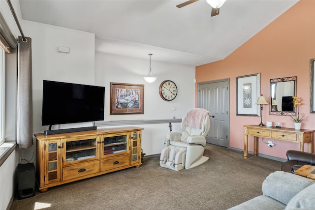467 Ridgeway Dr, Lolo, MT 59847 - carpeted living room with ceiling fan and vaulted ceiling
