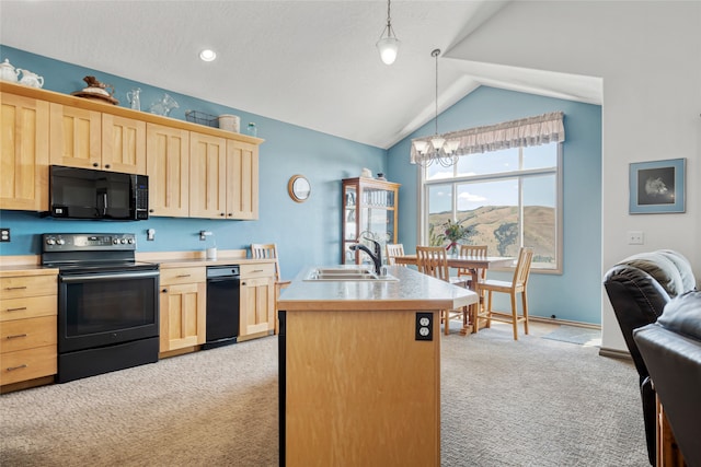 467 Ridgeway Dr, Lolo, MT 59847 - kitchen with black appliances, light brown cabinets, light carpet, a chandelier, and lofted ceiling