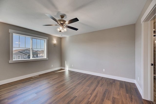 2933 Travis Ave, Helena, MT 59601 - spare room featuring dark wood-style floors and ceiling fan