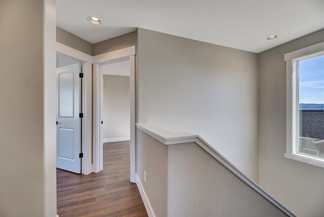 2933 Travis Ave, Helena, MT 59601 - corridor featuring dark wood-type flooring, recessed lighting, and an upstairs landing