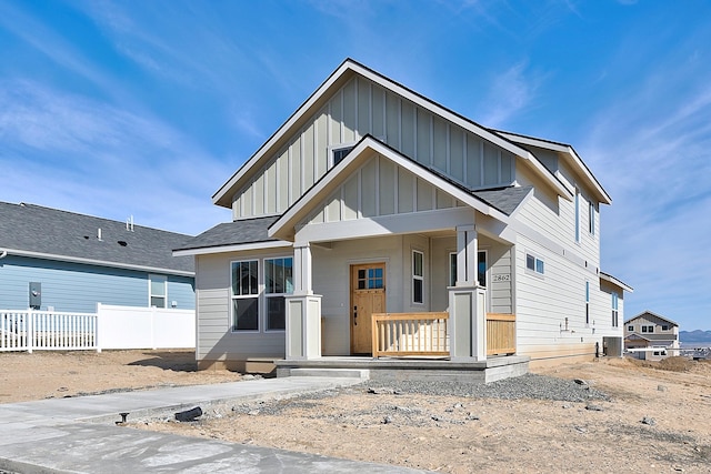 2933 Travis Ave, Helena, MT 59601 - view of front facade featuring a porch and board and batten siding