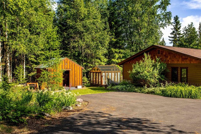 28578 Wapiti Ln, Bigfork, MT 59911 - view of home's exterior with an outbuilding