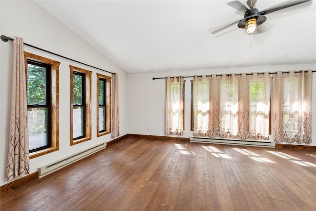 28578 Wapiti Ln, Bigfork, MT 59911 - unfurnished room with a baseboard heating unit, vaulted ceiling, hardwood / wood-style flooring, and ceiling fan