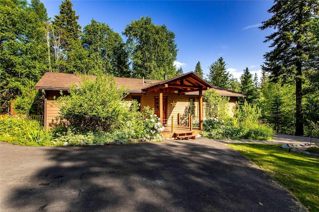 28578 Wapiti Ln, Bigfork, MT 59911 - view of front facade with covered porch